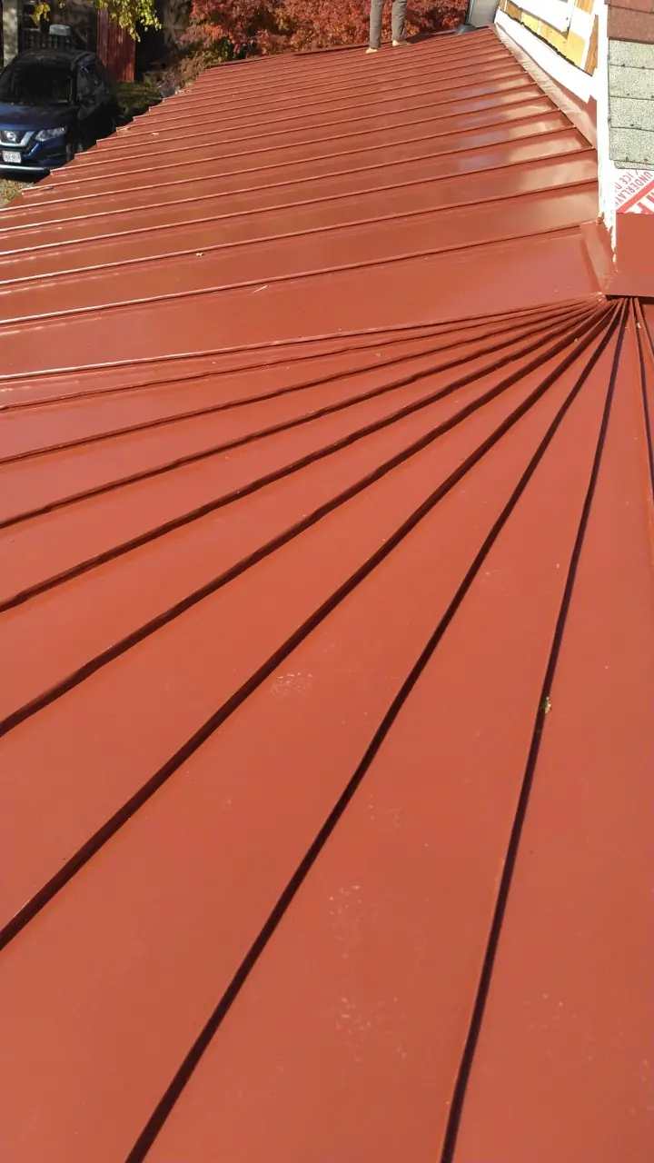 Red tapered panels converging on a curved section.